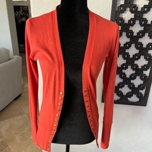 Burnt orange snap button jersey cardigan